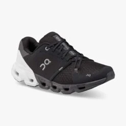 'On Running' Men's Cloudflyer 4 - Black / White -Carhartt || Under Armour || The North Face Shop 71.98677 cloudflyer 4 fw22 black white m g6 1024x1024@2x